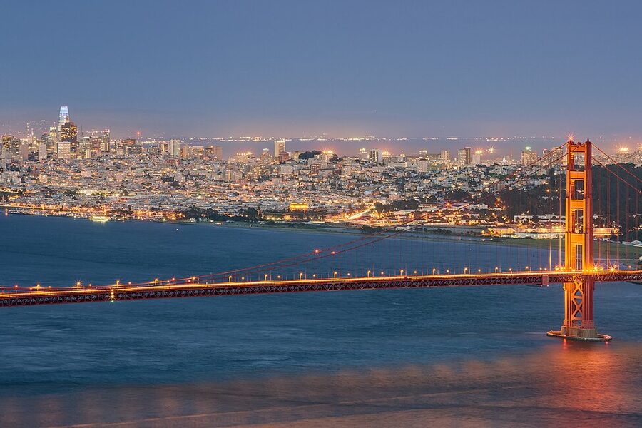 Golden Gate Bridge with the San Francisco skyline at blue hour