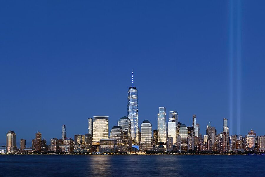 Lower Manhattan skyline across the Hudson River at dusk
