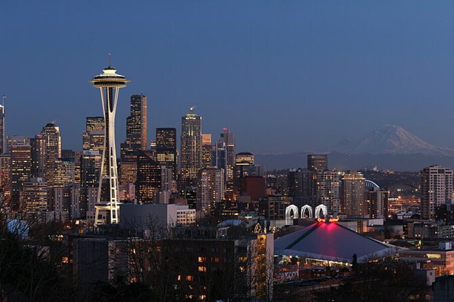 Seattle skyline at dusk with the Space Needle and Mount Rainier